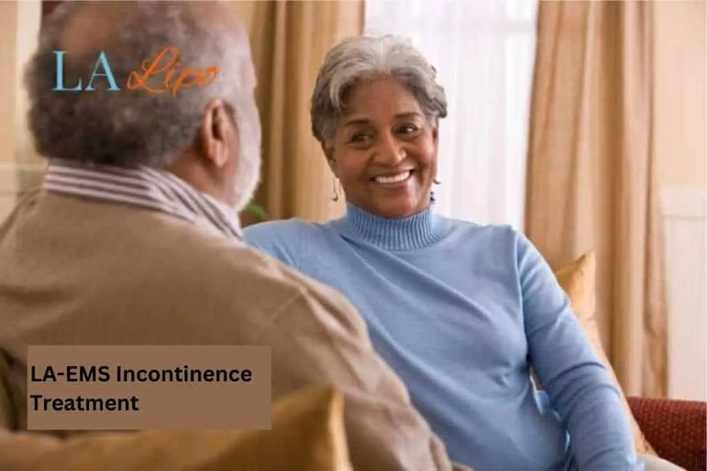 Couple sat smiling at each other - LA-EMS treatment Pinner