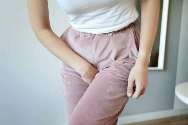 woman running for the toilet because of urinary incontinence Pinner